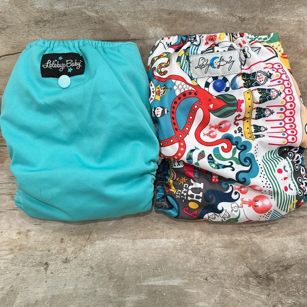 Lalabye Baby, one size cloth diapers reusable. Pair, one print one solid. *USED*